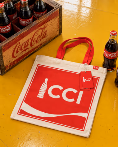 Coca Cola için Positive Studio merch üretimi