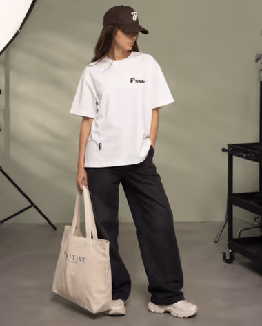 Tchibo için Positive Studio merch üretimi